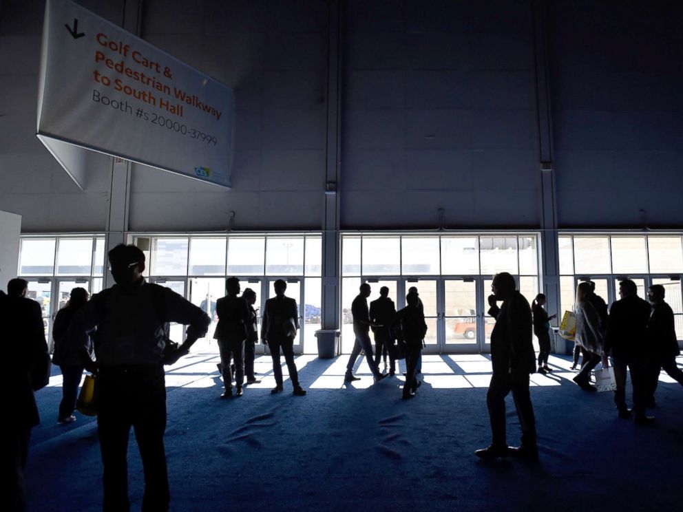 PHOTO: Attendees stand around after the power went out during CES 2018 inside the central hall at the Las Vegas Convention Center, Jan. 10, 2018, in Las Vegas.