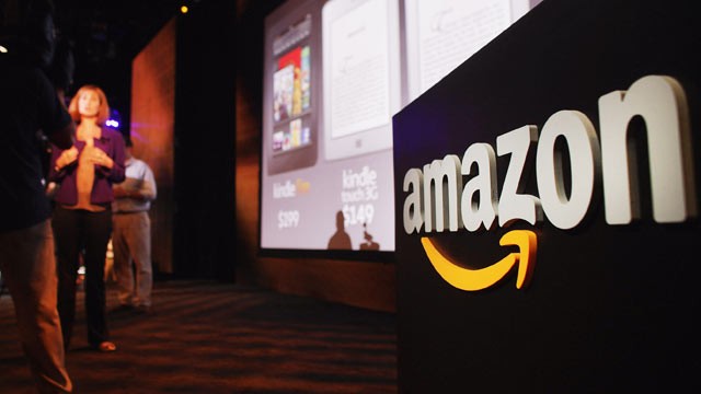 PHOTO: Members of the media cover the launch of the new Amazon tablet called the Kindle Fire,New York City, Sept. 28, 2011.