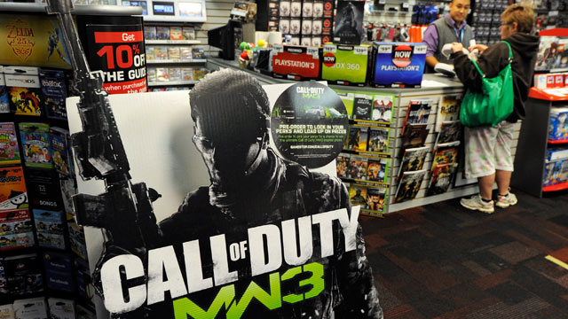 PHOTO: A cardboard display advertises the highly anticipated video game, "Call Of Duty: Modern Warfare 3" at a GameStop Corp. store.