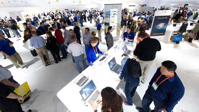 PHOTO: Attendees walk through the Samsung Electronics Co. booth at the International Consumer Electronics Show in Las Vegas, Nevada, Jan. 13, 2012.
