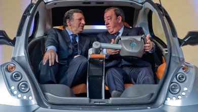 PHOTO: EU commission president Jose Manuel Barroso and Jesus Echave, chairman of the Hiriko-Afypaida corporate consortium, sit in the first prototype of the Hiriko electric car, during the global launch of Hiriko driving mobility at the EU commission head
