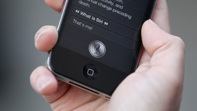 PHOTO: A man uses "Siri" on the new iPhone 4S.