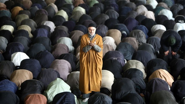 PHOTO: Iranian men perform the weekly Friday prayer at Tehran University.