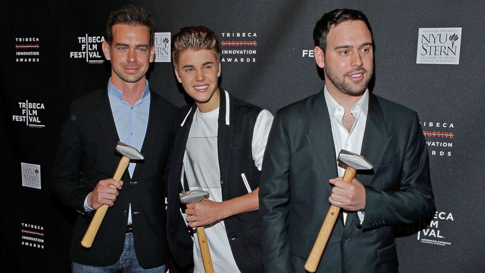 PHOTO: Twitter founder Jack Dorsey, singer Justin Bieber and Scooter Braun, left to right, attend the Tribeca Disruptive Innovation Awards during the 2012 Tribeca Film Festival, April 27, 2012, in New York.
