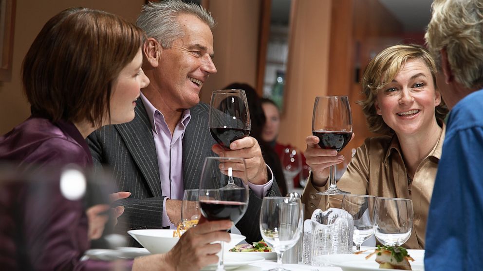 Photo: People at a restaurant talking