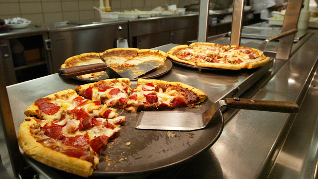 PHOTO: Pizzas available for lunch are seen in the kitchen at Jones College Prep High School in Chicago, Illinois.