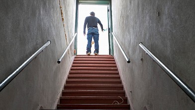 PHOTO: Getting up and walking around the office or up and down the stairs in your office building can help keep you warm.