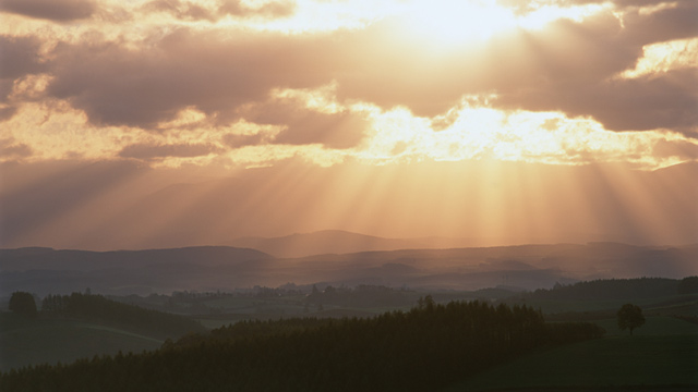 PHOTO: Sunlight shines through clouds