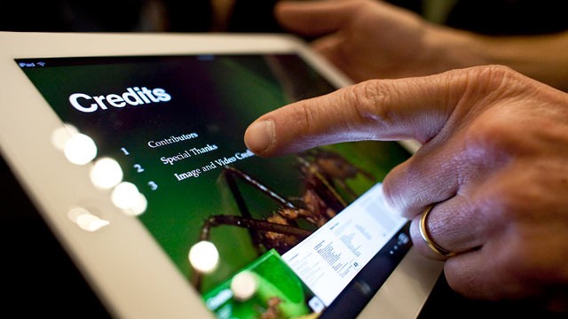 PHOTO: An employee demonstrates an Apple Inc. iPad 2 during a news conference at the Guggenheim Museum in New York City on Jan. 19, 2012.