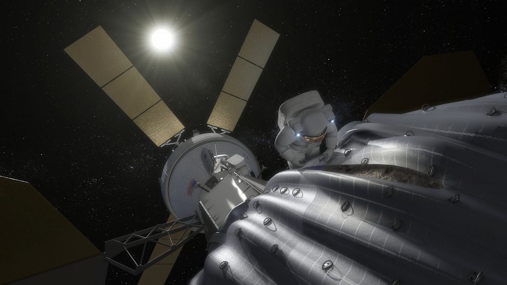 PHOTO: Astronaut taking samples from asteroid