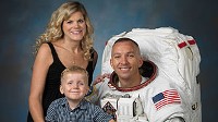 Astronaut Randy Bresnik with wife Rebecca and their three-year-old son Wyatt, shortly after he was assigned to the current flight of the space shuttle Atlantis.  Rebecca was due with their second child four days after Randy?s liftoff.