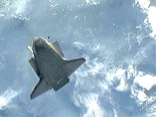 Shuttle Docks at Space Station, Looks 'Beautiful'