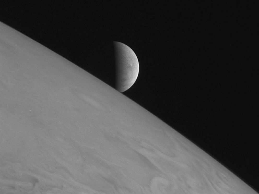 PHOTO: New Horizons took this image of the icy moon Europa rising above Jupiters cloud tops with its Long Range Reconnaissance Imager (LORRI)on Feb. 28, 2007.