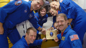 STS-125 Crew at the Hatch