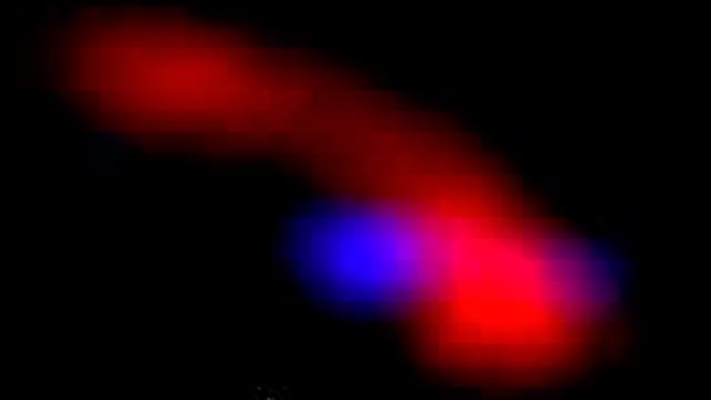 PHOTO: A computer-processed image of LkCa 15 b, a planet still forming from the dust around a young star is shown.