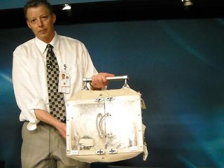 Tool Bag With Grease Guns Float Away in Space