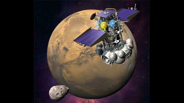PHOTO: An artist's concept of the Phobos-Grunt spacecraft nearing the Martian moon Phobos.