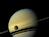 Saturn and moon Titan seen from Cassini Probe