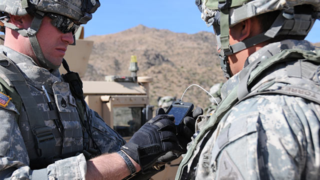 PHOTO: Soldiers using consumer smartphones during field exercises