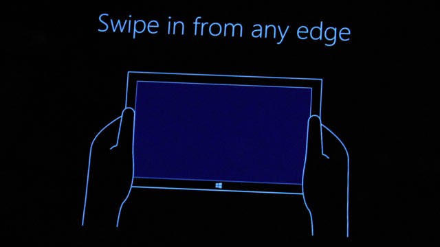 PHOTO: A instructional screen that appears before you start using Windows 8.