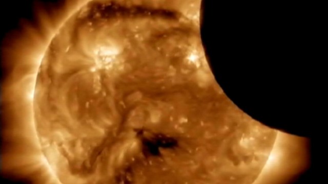 VIDEO: NASA's Solar Dynamics Observatory watches moon pass sun's face.
