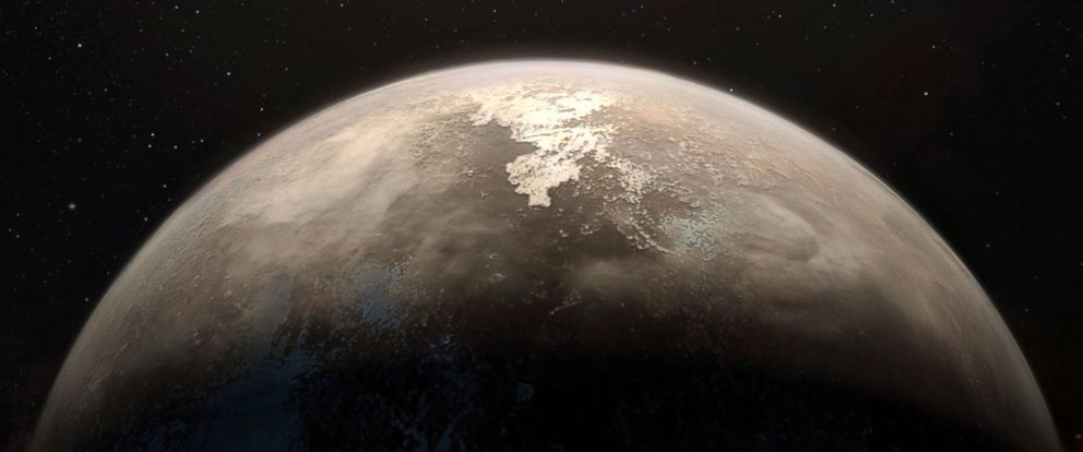 PHOTO: This illustration made available by the European Southern Observatory, Nov. 15, 2017, shows the planet Ross 128 b, foreground, which orbits a red dwarf star, 11 light-years from Earth. 