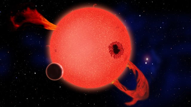 PHOTO: When it's young, a red dwarf star frequently erupts with strong ultraviolet flares as shown in this artist's conception; scientists have calculated that six percent of red dwarf stars probably have Earth-size planets orbiting them.