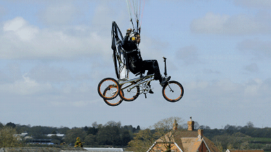 PHOTO: Test pilot Kester Haynes rides the XploreAir X1, the world first production flying bicycle, June 5, 2013.