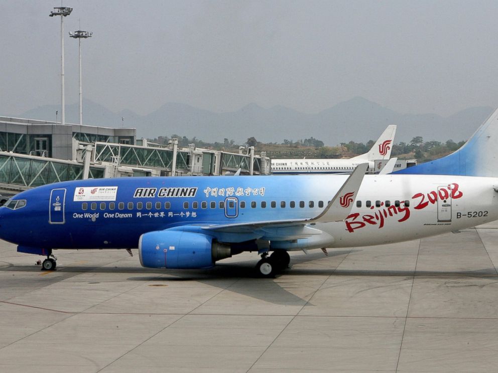 PHOTO: An Air China Boeing 737 jet painted to promote the Beijing 2008 Olympic Games, prepares to leave Chongqing airport, Aug. 20, 2006.