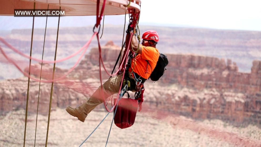 VIDEO: The Grand Canyon Skywalk doesnt clean itself, but thankfully these technicians are up to the task.