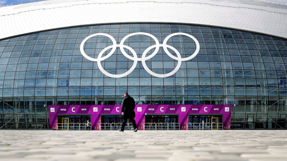 PHOTO: A man walks toward the Bolshoy Ice Dome, which is venue for Ice Hockey matches ahead of the 2014 Winter Olympics, Feb. 5, 2014, in Sochi, Russia.