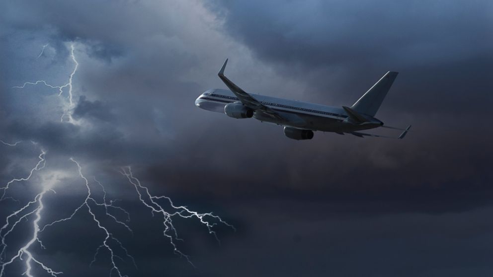 PHOTO: In this stock image, a plane is pictured flying during a lightning storm. 