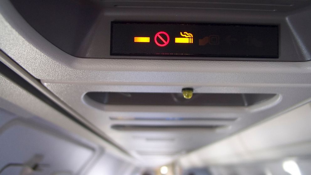 PHOTO: cigarette, smoking, airplane, travel