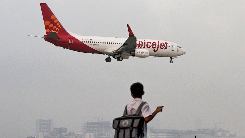 PHOTO: A SpiceJet Ltd. aircraft prepares to land at Chhatrapati Shivaji International Airport in Mumbai, India, Sept. 17, 2012.