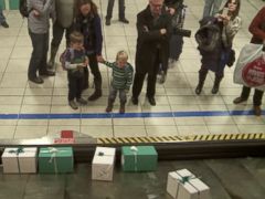 PHOTO: Passengers on a WestJet flight had their Christmas wishes fulfilled with the help of 175 WestJet volunteers.