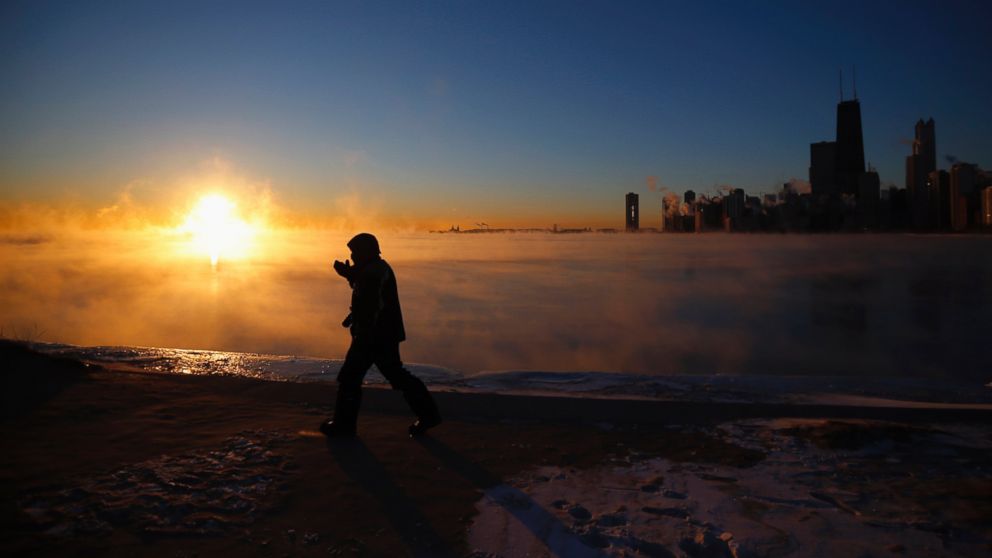 PHOTO: A man is silhouetted against the fog off Lake Michigan in Chicago, Ill., Jan. 28, 2014.