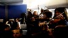 VIDEO: The string musicians of Amsterdam Sinfonietta play an impromptu Mozart concert.