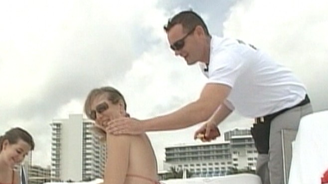 Video: Florida locals apply to be a tanning butler.