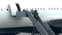 Man Attempts to Set Off Explosives on Northwest Airlines Plane