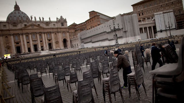 PHOTO: A worker places rows of chairs in St. Peter's Square ahead of Pope Benedict XVI last public audience, at the Vatican, Feb. 25, 2013. Large crowds are expected to be in the next few days.