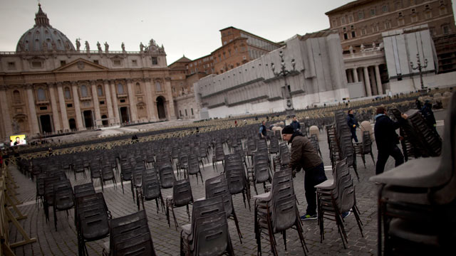 PHOTO: A worker places rows of chairs in St. Peters Square ahead of Pope Benedict XVI last public audience, at the Vatican, Feb. 25, 2013. Large crowds are expected to be in the next few days.