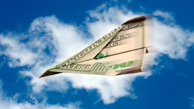 PHOTO: $100 bill paper airplane