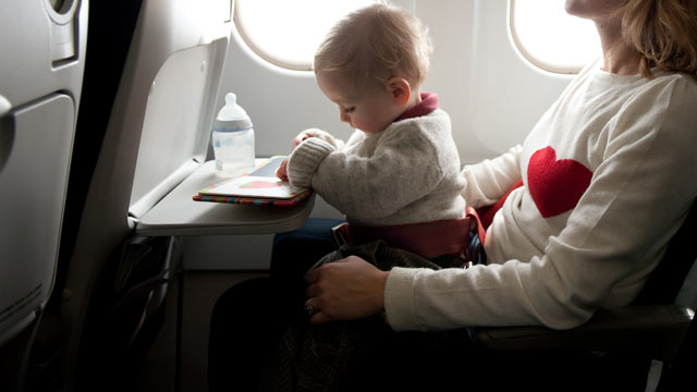 PHOTO: Babies under the age of two who are allowed to fly for free if seated on a parents lap.