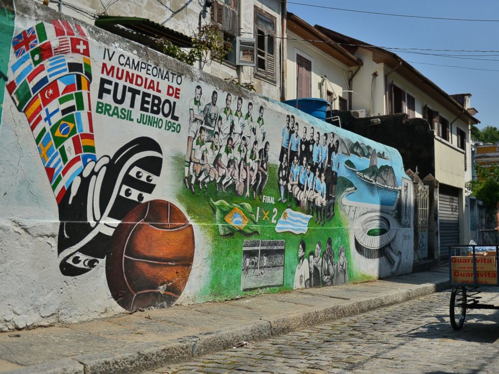 PHOTO: View of a mural paint depicting the final match of the 1950 FIFA World Cup, Brazil vs Uruguay, in Rio de Janeiro on April 8, 2014, Brazil.