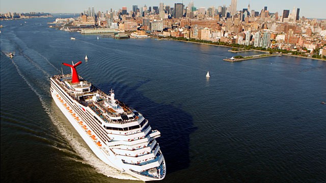 PHOTO: The Carnival Glory cruise ship passes the west side of Manhattan along the Hudson River in this aerial photograph taken over New York.