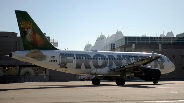 PHOTO: A Frontier Airlines plane taxis at Denver International Airport in Denver, Dec. 2, 2011.