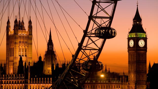 PHOTO: Big Ben, The London Eye and Parliment are seen at dusk in London, England.