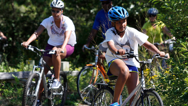 PHOTO: Sasha Obama and first lady Michelle Obama bike while vacationing on Marthas Vineyard, August 23, 2011, in West Tisbury, Mass.