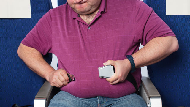 PHOTO: In 2012, former chief economist at Qantas Group floated the idea that heavy people should pay more to fly.