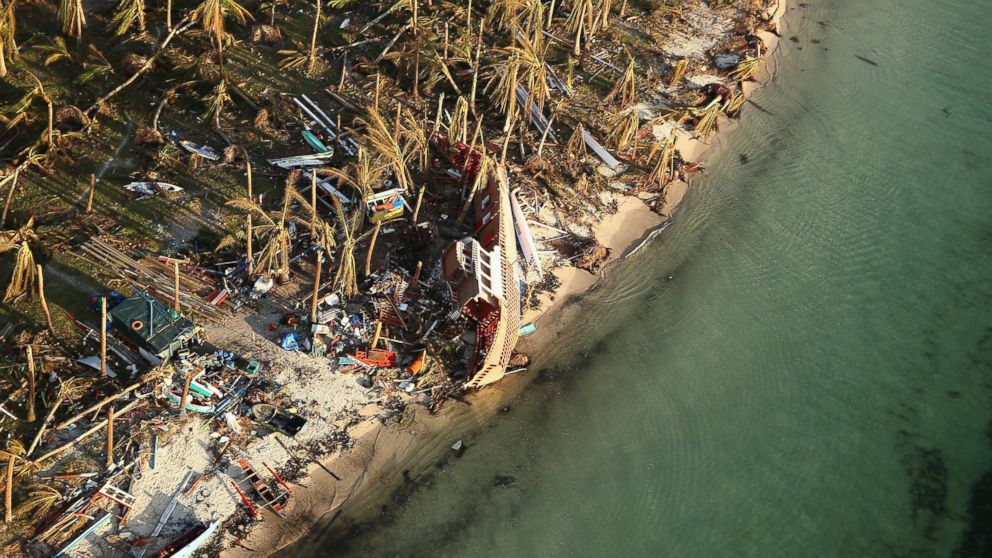 PHOTO: An aerial view of a boat washed up ashore on the demolished coastal town of Eastern Samar Island on November 14, 2013 in Leyte, Philippines.